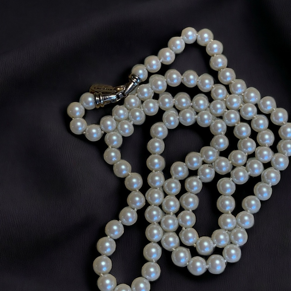 Kissaka hand knotted glass faux pearl strand.